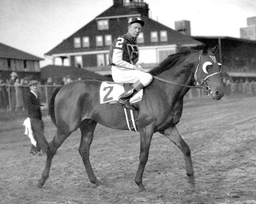 Seabiscuit with jockey Johnny “Red” Pollard (1936) via paulickreport.com