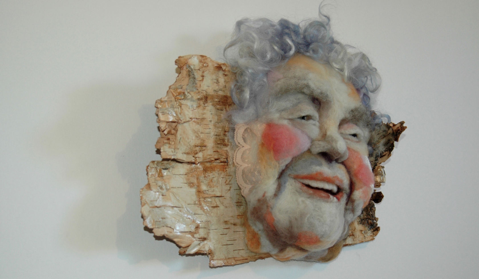 Art of Aging: Rosemarie Péloquin, “Rose Alba,” Hand needle-felted wool bas-relief on birch bark backing, 2016