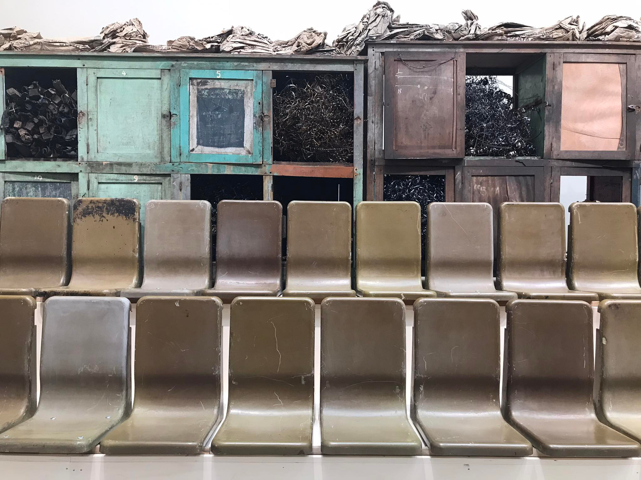 A part of the installation "Parliament of Ghosts," by Ibrahim Mahama, exposed at Venice Biennale of Architecture, 2023. From the accompanying text: "The work originally addressed historical ideas around materials and issues of colonial exploitation […]. The space was inspired by both the residue of the Gold Coast Railway infrastructure and abandoned modernist buildings from the 1960s Nkrumah’s Volini in Tamale (Ghana). How do we restore memories to which access was denied? How do we excavate the past in order to build new futures?" Photo: Olga Bubich ©