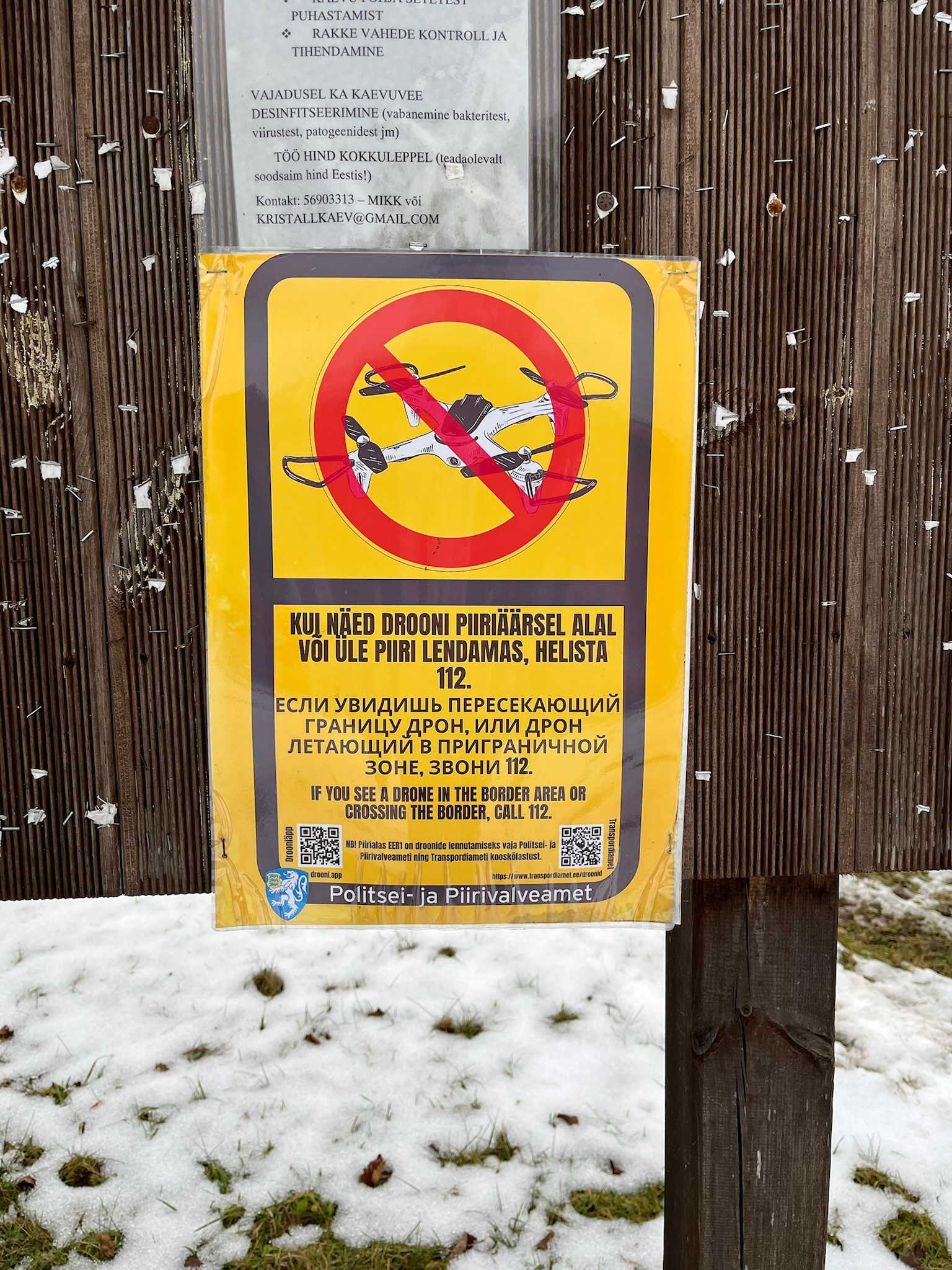 Fear is trilingual (Russian, Estonian, English): “If you see a drone in the border area or crossing the border, call 112”