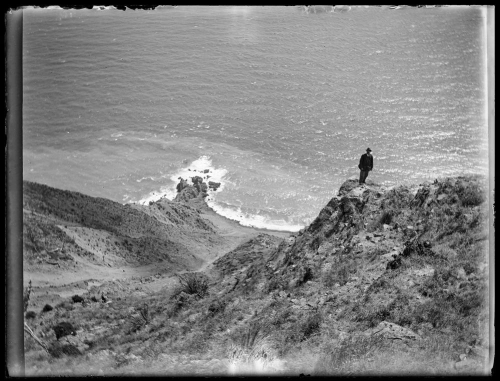 Looking down the 1700ft cliff to sea-level from Kapiti trig, 24 February 1921, Kāpiti Island, by Leslie Adkin. Gift of G. L. Adkin family estate, 1964. Te Papa (A.005929)