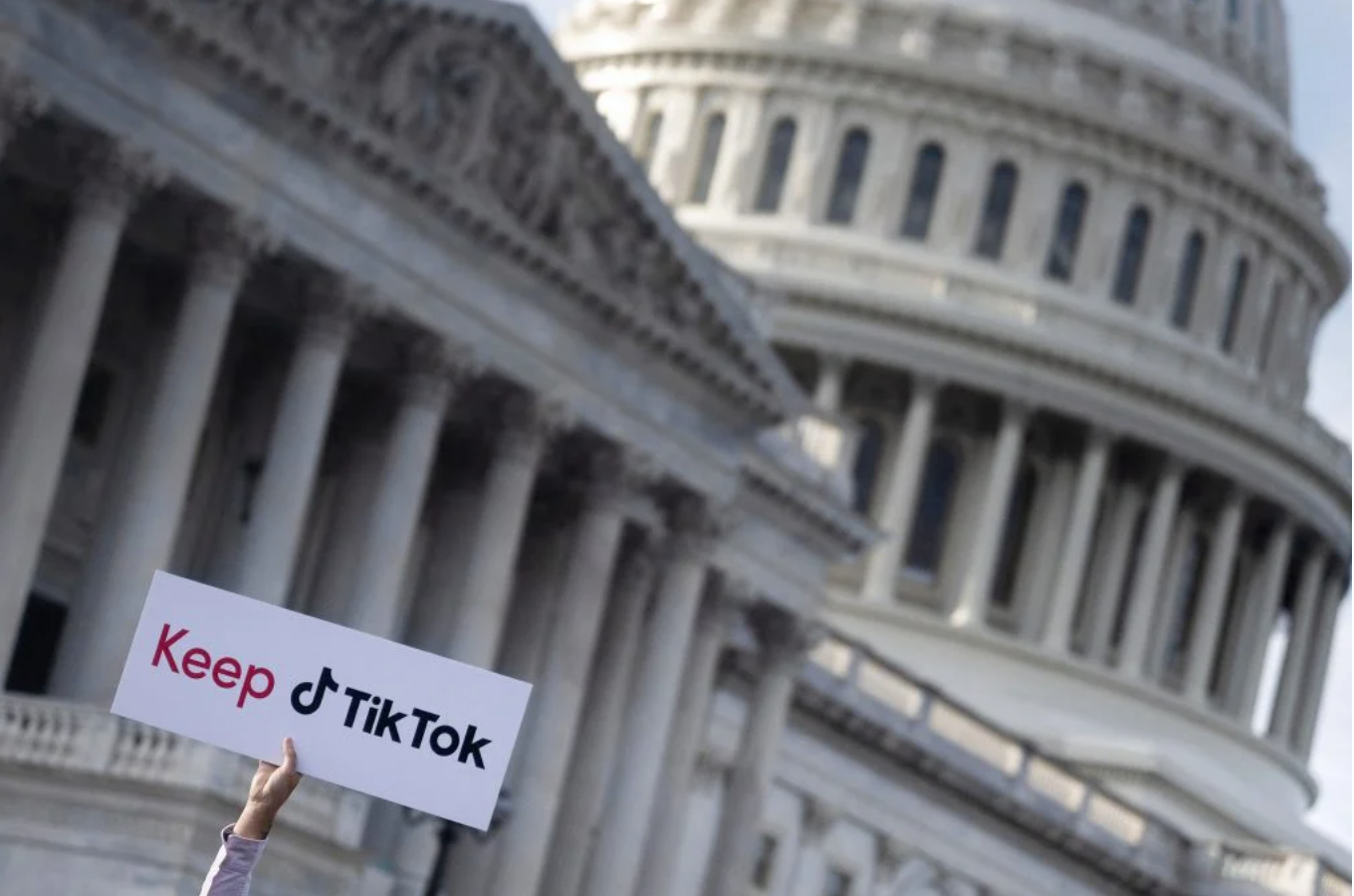 A sign held aloft during a press conference opposing a TikTok ban at Capitol Hill in Washington, DC on March 22, 2023. Photo: Brendan Smialowski / AFP.