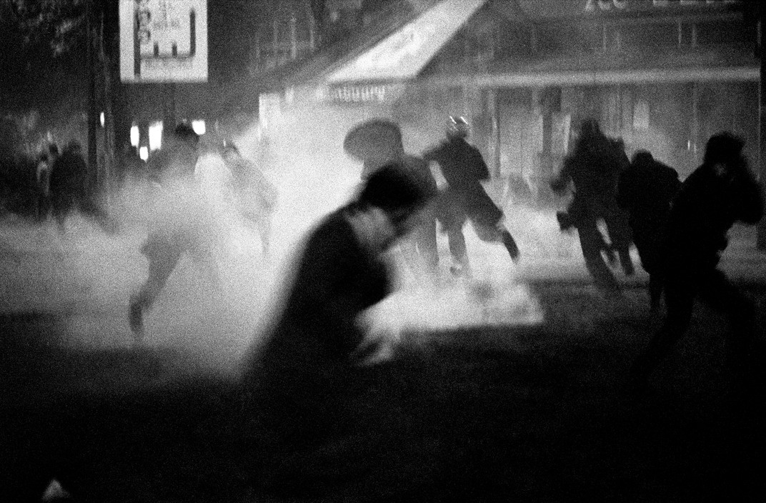 Bruno Barbey. Night between the 10th and the 11th of May 1968. Boulevard St. Michel. Explosion of teargas.